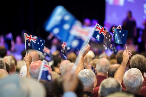 Crowd-waving-flags-from-rear-1.jpg