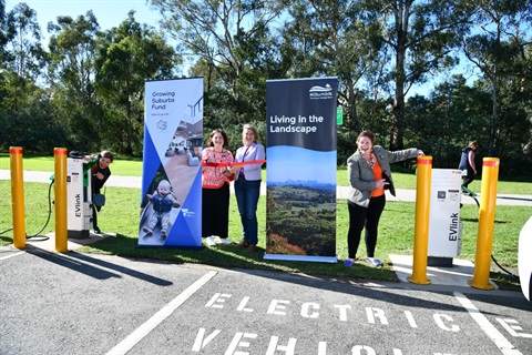 This is a photograph of Yan Yean MP Danielle Green, Nillumbik Mayor Frances Eyre, Eltham MP Vicki Ward and Edendale Ward Councillor Natalie Duffy officially opening the new solar system and car charging station at the Eltham Leisure Centre.