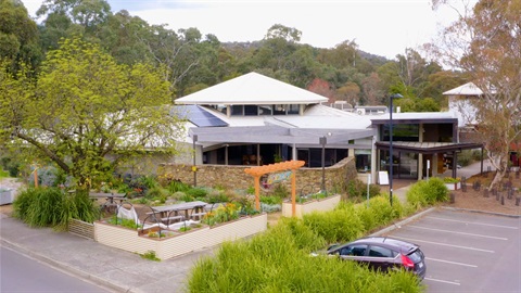 A community centre with garden out the front