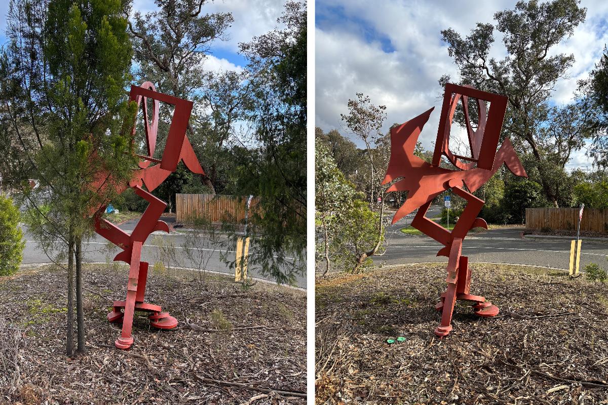 There are two pictures of a dark orange sculpture, the first is partly hidden by small trees, the second has a clearing around it