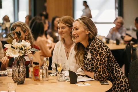 Local business owners networking at event