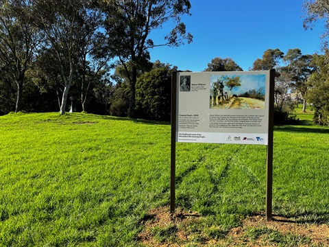 This is a photograph of one of the signs along the Heidelberg School Artist Trail in Alistair Knox Park depicting the work of Walter Withers.