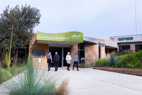 This is a photograph of people walking into and out of Council's Civic Centre in Greensborough.