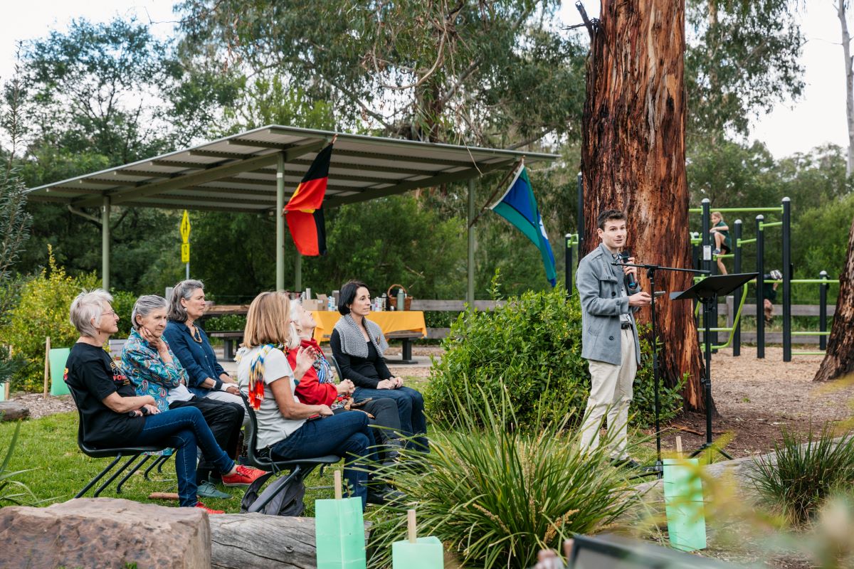 This is a photograph of Mayor Ben Ramcharan speaking at the opening of the Eltham North Adventure Playground Wurundjeri Seasonal Garden.