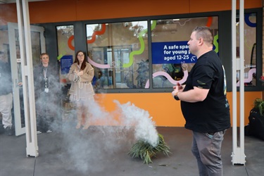 This is a photograph of the smoking ceremony  from the official opening of the Nillumbik Youth Hub