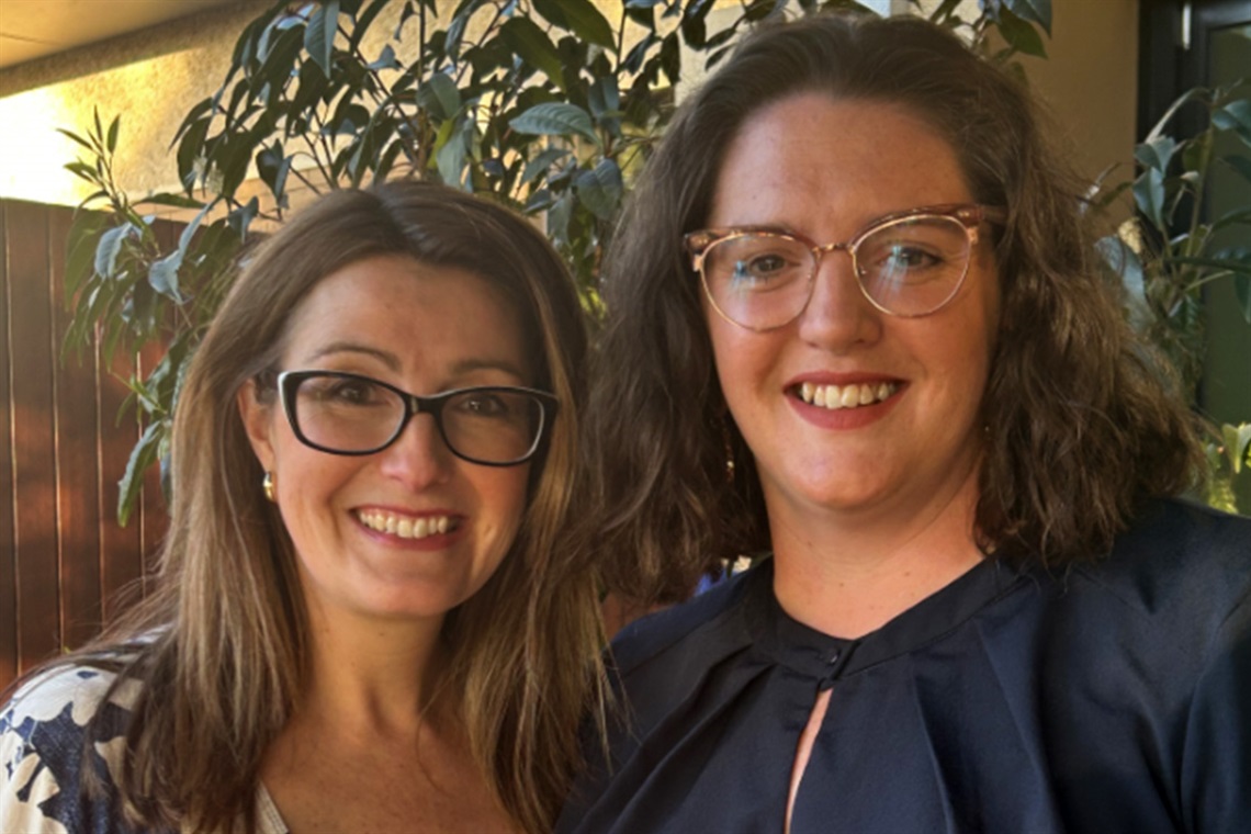 Mayor Naomi Joiner (left) smiling with Deputy Mayor Kate McKay, also smiling